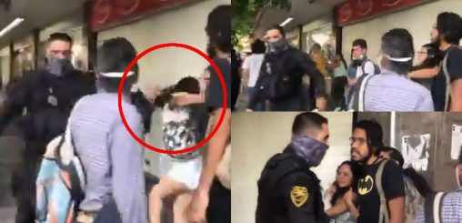 COBARDE “policía” jala el pelo a mujer para intentar detenerla durante protestas en Jalisco (VIDEO)